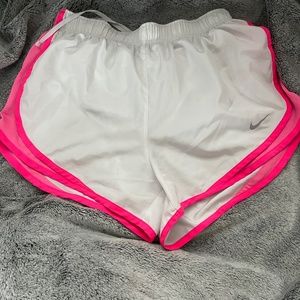 white and pink nike dri-fit shorts